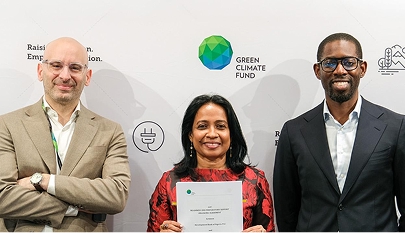 GCF Director of Investment Services, Achala Abeysinghe (centre), Head of Readiness, Pavlos Troulis (left), and GCF Regional Manager for West Africa, Landry Ahouansou (right), at the signing ceremony.